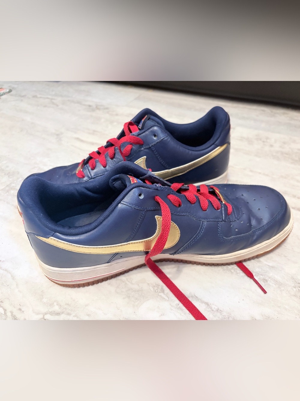 Nike Air Force 1 Low Olympic Sneakers with Gold Swoosh